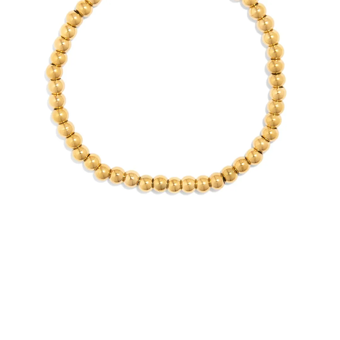 STAINLESS STELL GOLDEN DOTS BRACELET